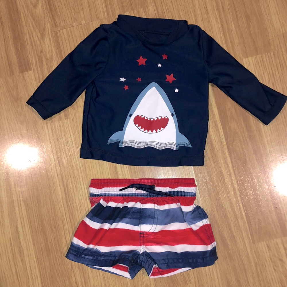 Carters 3 months swim trunks and long sleeve swim top. NWOT. Never used.